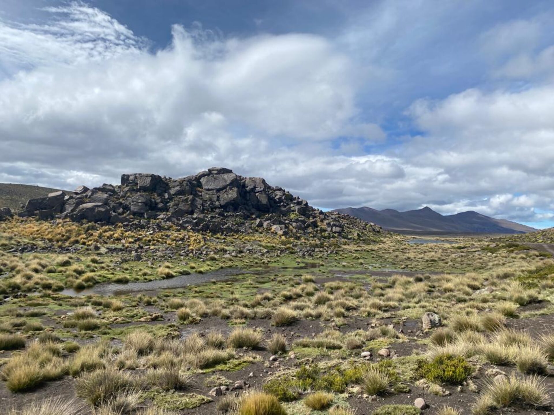 Dramatic volcanic rock formation at Sallalli spring, Peruvian Andes