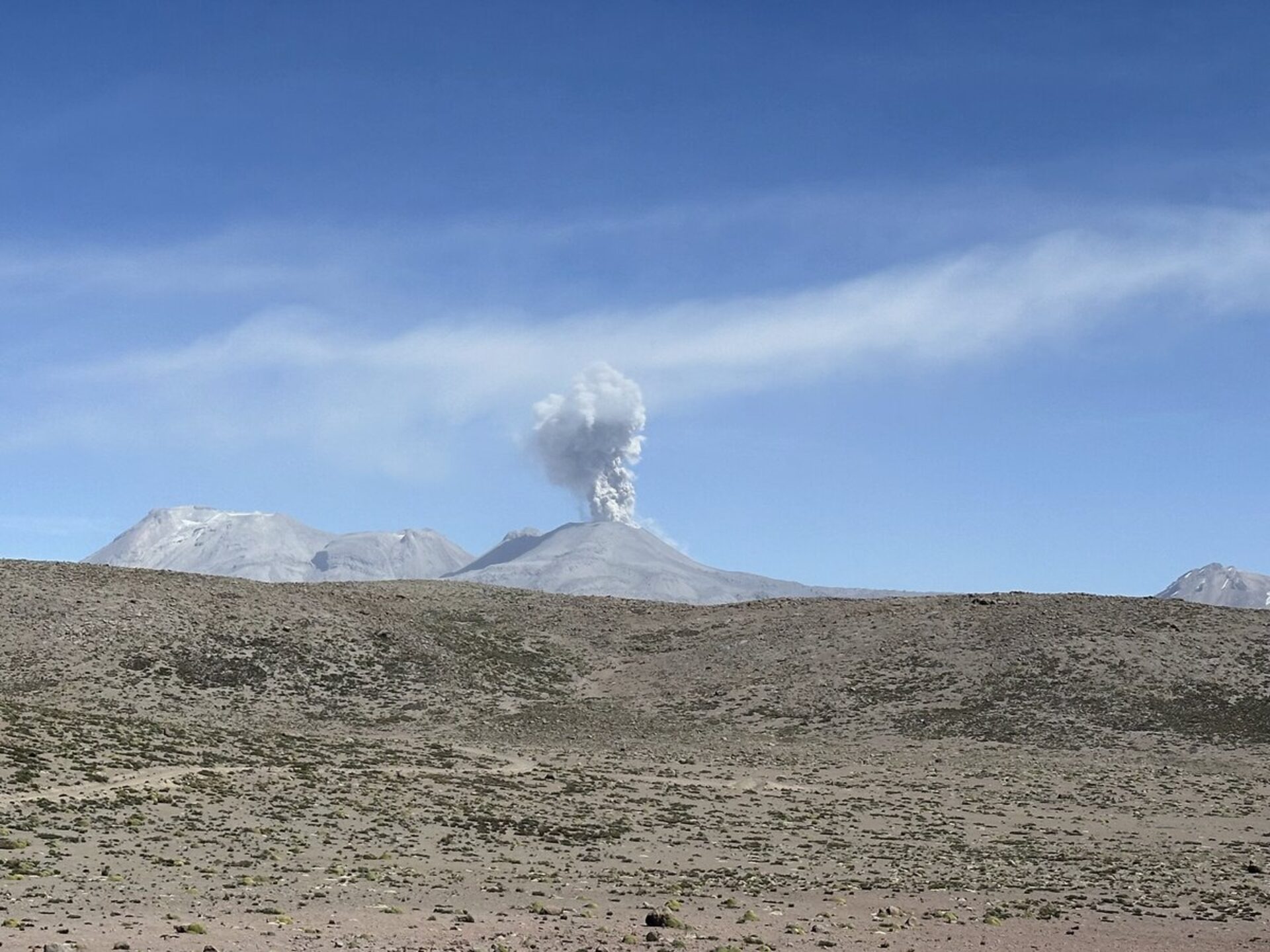 Active Sabancaya volcano seen from the Sallalli property — volcanic geology that shapes the water's mineral profile